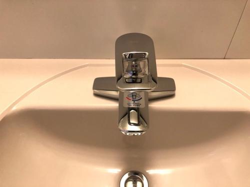 a chrome bathroom sink with a faucet on it at Sunwest Hotel Sasebo - Vacation STAY 22136v in Sasebo