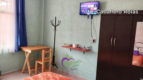 Una televisión o centro de entretenimiento en Mixtlaxotla Zacatlán Tours