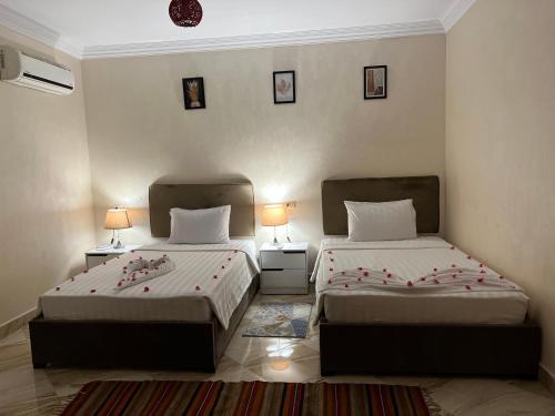 Pyramids Desert Gate Hotelにあるベッド