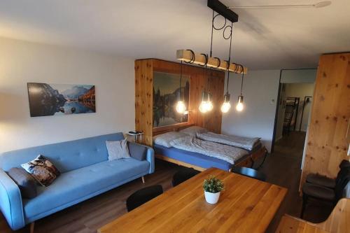 Postel nebo postele na pokoji v ubytování Stilvolle Wohnung mit traumhaftem Bergblick