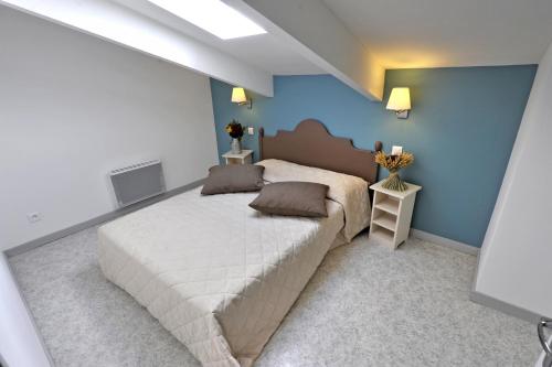 Ένα ή περισσότερα κρεβάτια σε δωμάτιο στο VVF Drôme Provence