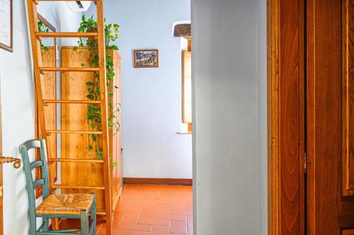 Μία ή περισσότερες κουκέτες σε δωμάτιο στο Agriturismo Pian di Fiume
