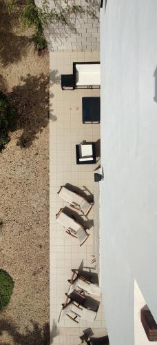 an overhead view of a group of horses on a wall at Superb large private villa with pool in Prainha