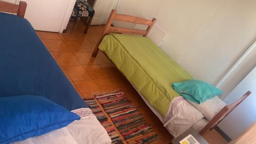 Cama ou camas em um quarto em Hostal del Prado