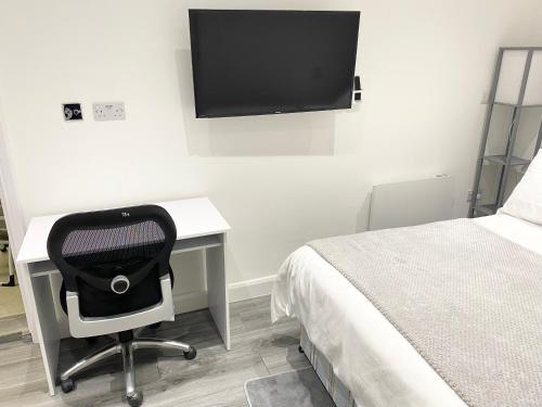 TV a/nebo společenská místnost v ubytování London Studio