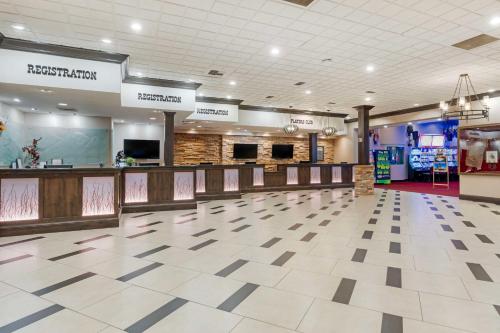 a large lobby with a check in counter at Best Western Plus Boomtown Casino Hotel in Reno