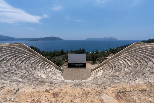 a large amphitheater with a sign in the middle at Radisson Blu Hotel, Kas in Kas