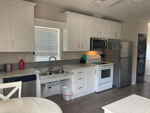 Küche/Küchenzeile in der Unterkunft Cottage in Arbor Terrace Resort