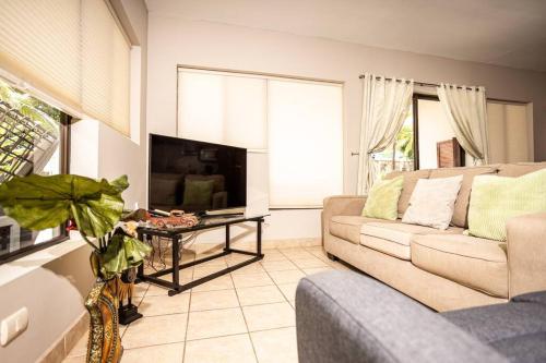 Condo Pacificoにあるテレビまたはエンターテインメントセンター