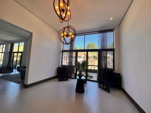 Χώρος καθιστικού στο Loft Cama King 3 min do centrinho