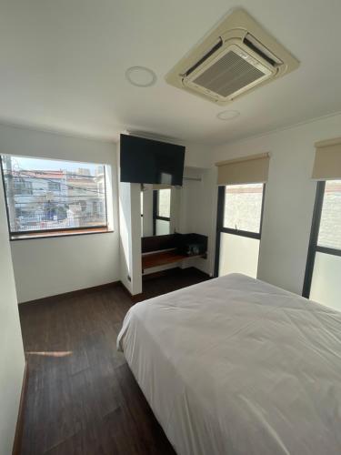 Katil atau katil-katil dalam bilik di Hotel Boutique Ossido Nero