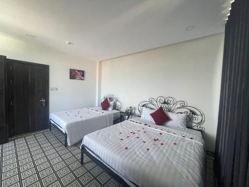 Ένα ή περισσότερα κρεβάτια σε δωμάτιο στο TIMES HOTEL
