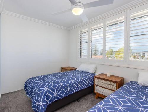 Un pat sau paturi într-o cameră la Kingscliff Beachfront Abode - Hosted by Holiday Management