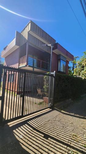 a gate in front of a house at 215 Cacique Catrini in Licán Ray