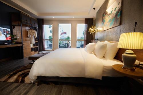 HaNoi Calido Hotelにあるベッド