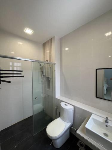 a bathroom with a toilet and a shower and a sink at 4B12B Bar 5 min City Center-no karaoke in Ipoh