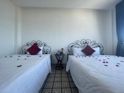Ένα ή περισσότερα κρεβάτια σε δωμάτιο στο TIMES HOTEL