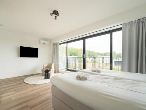 Снимка в галерията на Cosy, modern family villa up to 6p in Flevoland in a wonderful environment в Зеволде