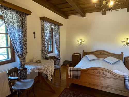 A bed or beds in a room at Cziróka Vendégház