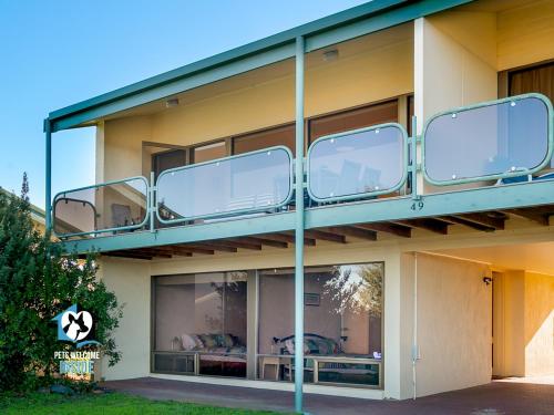 a building with a balcony on top of it at Beautiful Sea Front 3BR with Great Views in Encounter Bay