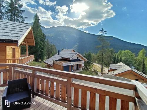 a view from the deck of a cabin in the mountains at Chalet Kelly in Les Orres