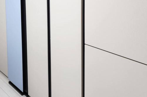 a group of four glass doors on a building at For you House in Daegu