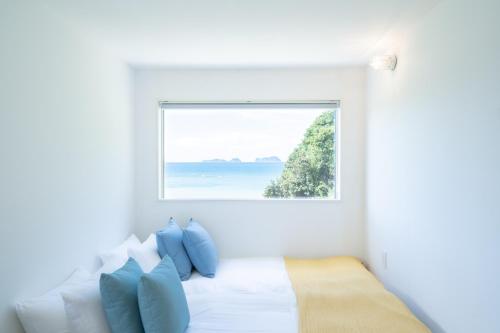 Cama o camas de una habitación en TOMORROW-COAST