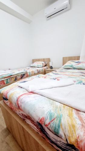 Rooms LikeHomeにあるベッド