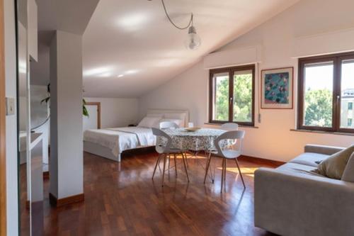 Ένα ή περισσότερα κρεβάτια σε δωμάτιο στο Casa Cecilia