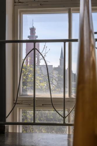 a glass table in front of a window at Hangon Asema 12 in Hanko