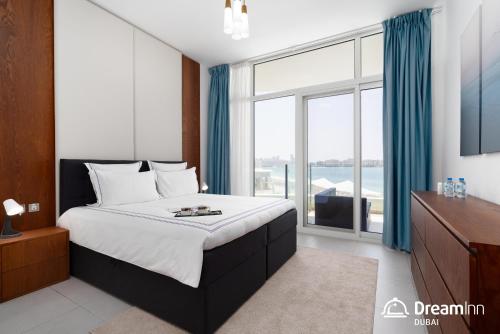 Postel nebo postele na pokoji v ubytování Dream Inn Apartments - Royal Bay