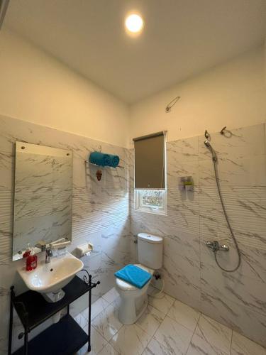 Ένα μπάνιο στο Sunnydays homestay
