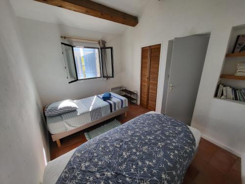 Postel nebo postele na pokoji v ubytování Villa Côté Mer, Provence style, near St Tropez