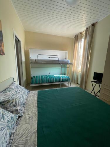 Katil atau katil-katil dalam bilik di De Sùra - La Terrazza sul Naviglio