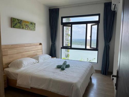 Postel nebo postele na pokoji v ubytování Forest city Sea view homestay