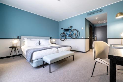Ein Bett oder Betten in einem Zimmer der Unterkunft Octant Lousa