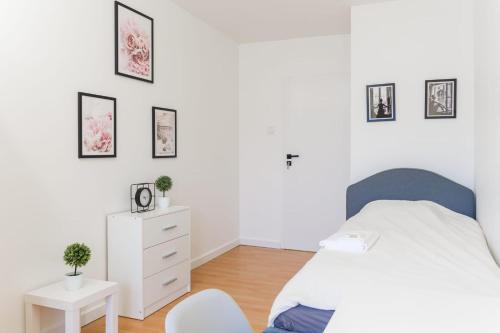 Ένα ή περισσότερα κρεβάτια σε δωμάτιο στο Apartament Puławska 105