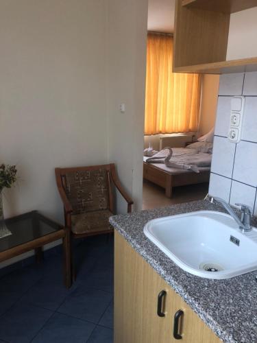 Postel nebo postele na pokoji v ubytování City Hotel Siófok