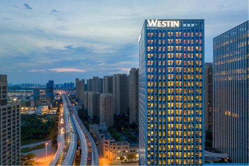 a view of a tall building in a city at The Westin Wuhan Hanyang in Wuhan