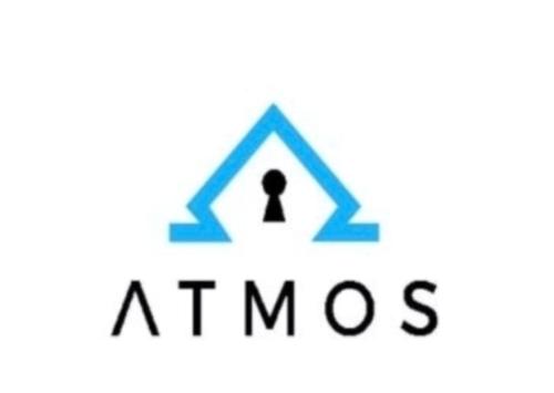 a blue and black sign that reads atmos at Central Leeds modern 1bed apartment in Leeds
