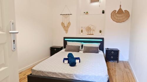 Кровать или кровати в номере La remise des Copains 2 chambres avec Clim OcKeys