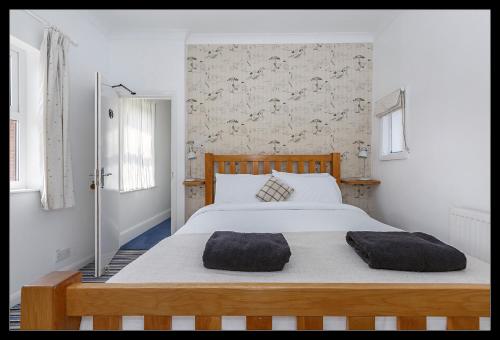 En eller flere senger på et rom på Overcliff Lodge, Mundesley sea view, sleeps 22