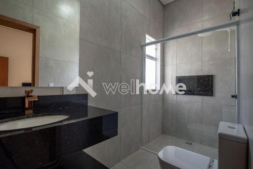 Ванная комната в Casa com 4 suítes em Riviera de Santa Cristina
