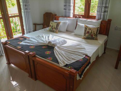 Postel nebo postele na pokoji v ubytování Rock Edge Residence