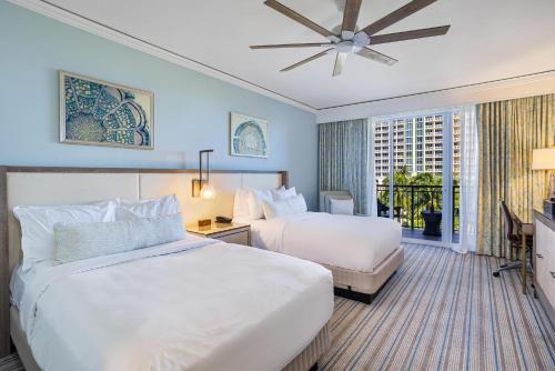a hotel room with two beds and a window at Gorgeous Partial Ocean View I The Ritz Carlton in Miami