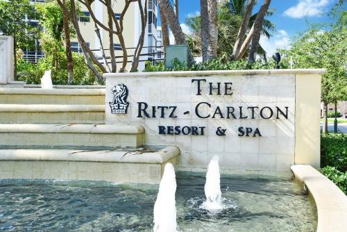 a sign for the ritz carlton resort and spa at Gorgeous Partial Ocean View I The Ritz Carlton in Miami