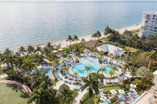 an aerial view of the pool and beach at the resort at Gorgeous Partial Ocean View I The Ritz Carlton in Miami