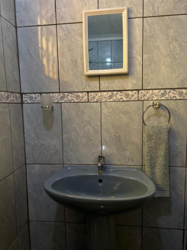 Ένα μπάνιο στο Duvha Guesthouse
