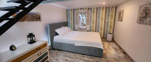 Postel nebo postele na pokoji v ubytování Morii Lake Pool Villa
