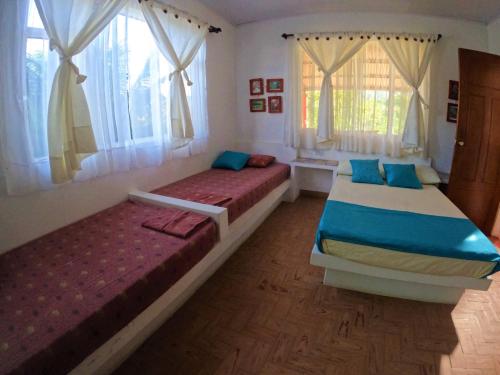 Postel nebo postele na pokoji v ubytování Finca Hotel Villaruth